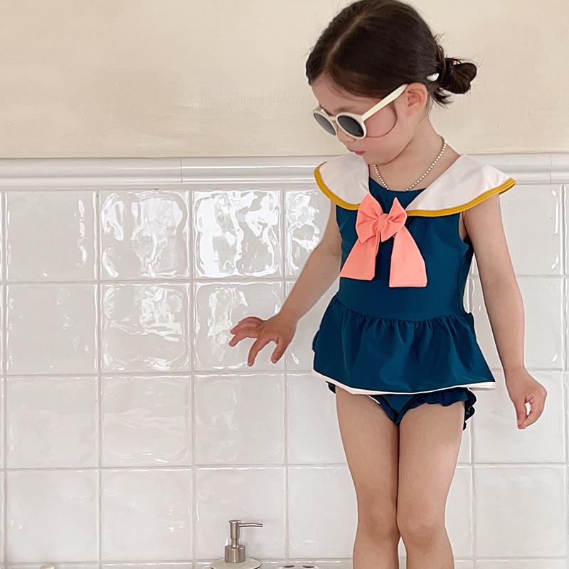 

Новый летний темно-синий купальник-двойка для девочек с розовым бантом в морском стиле - маленький и средний 120 cm