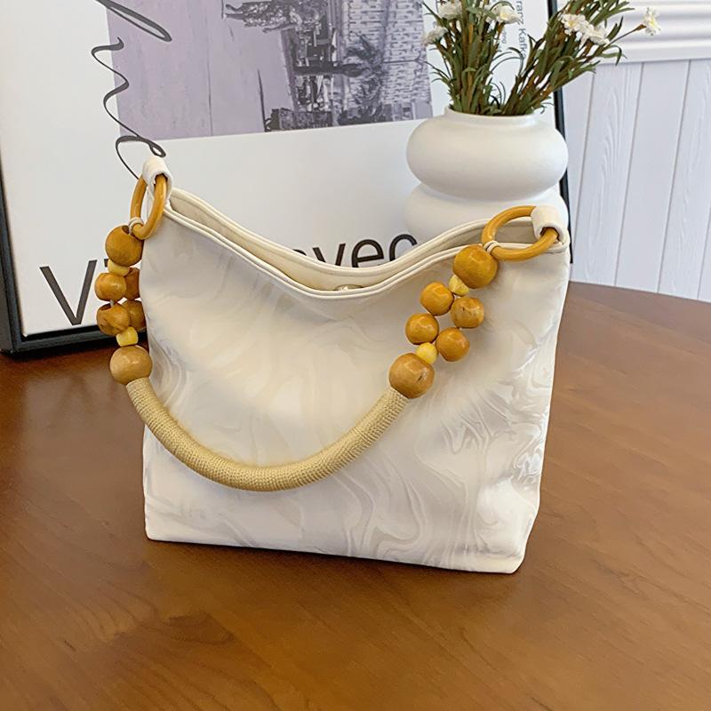 

Korean version of fashion underarm bag women s bag simple messenger bag women s 2024 summer new fashion simple casual shoulder bag бежевий