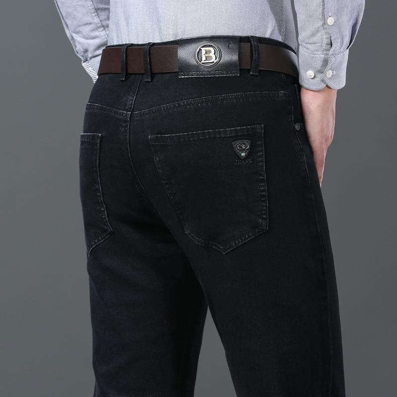 

2024 Осень и зима Новые чисто черные джинсы мужские свободные прямые брюки с высокой талией эластичные повседневные длинные брюки 40