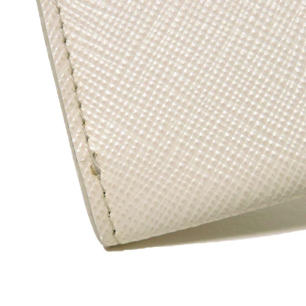 Used 11569 Saffiano Triangle Card Holder 1MC110 QHH F0009 7946 Current Calfskin White Bifold RFID Logo Bianco Unisex