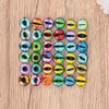 Yeux de Poupée TEHAUX, Lot de 50 Pièces, Diamètre 12mm, Motifs d'Yeux en Verre pour Yeux de Chat, Dinosaure et Animaux, Pièces d'Accessoires Faits Main, Décorations DIY, Poupée
