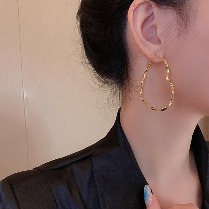 Golden Heart Hoop Earrings Minimalist Polished Metal Hoops Statement Love-Shaped Jewelry Gift for Women