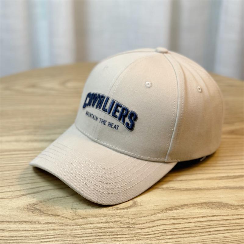 

This is a description of a baseball cap with a large brim, curved eaves, embroidered letters, a hard top, a small duckbill hat, and is suitable for Adult54-60Adjustable бежевый