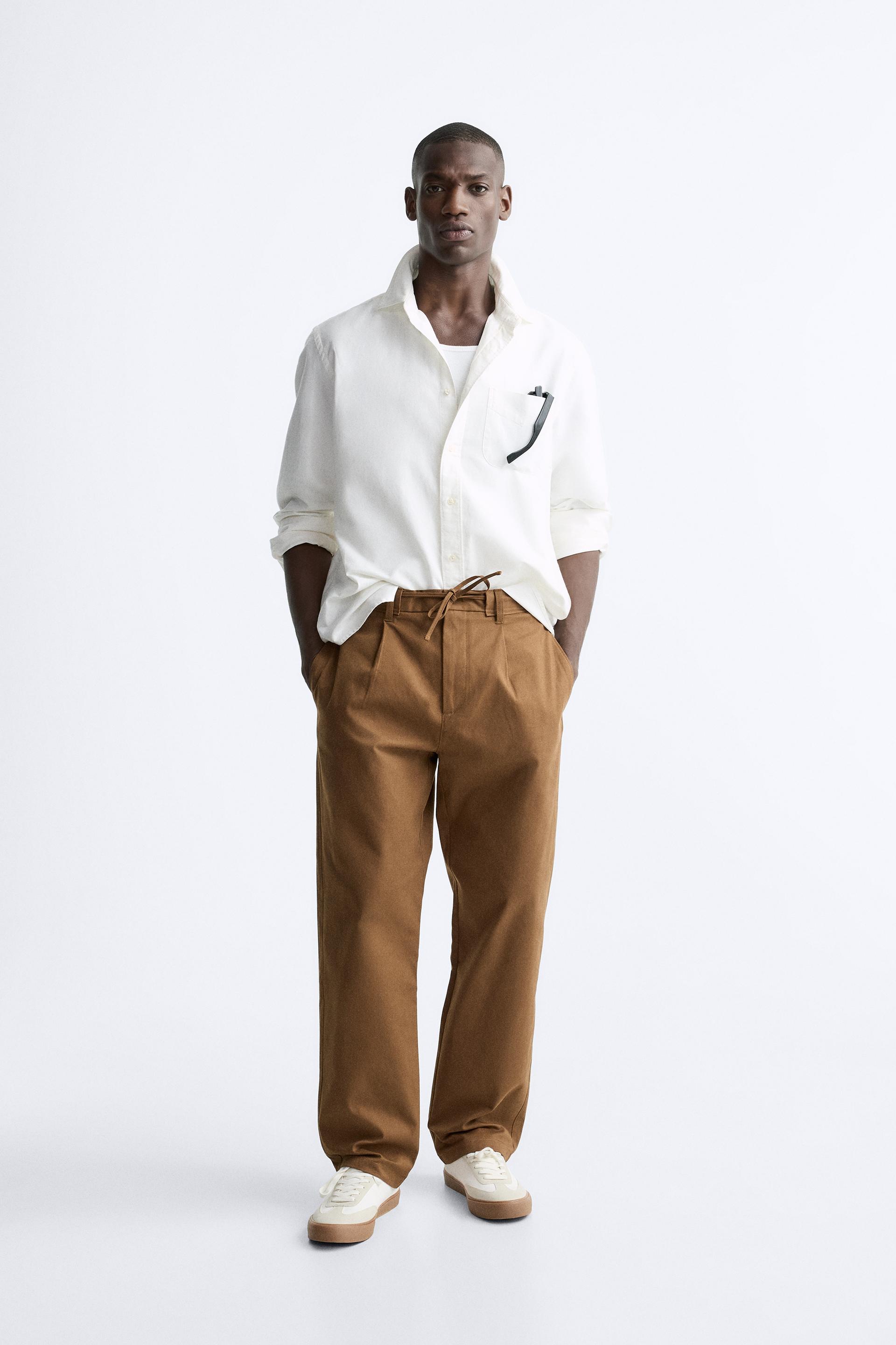 

БРЮКИ ПЛИССИРОВАННЫЕ НА КУЛИСКЕ