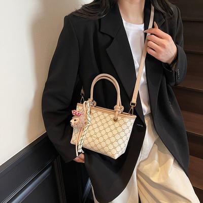 Petit sac rétro portable pour femmes, nouveau printemps populaire, polyvalent, sac bandoulière messager, sac seau pour les trajets quotidiens