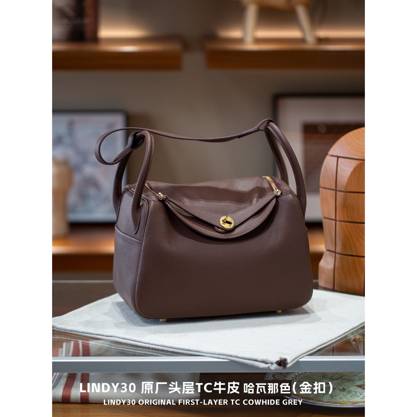 

Верхній шар TC коров яча шкіра 19/26/30 Косий крій Dukep Товста позолочена фурнітура з нержавіючої сталі Сумка під пахву Висококласне відчуття 19x9x12.5cm