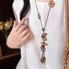 Retro Ethnisch Rund Holz Lang Pullover Halskette Damen Bohemian Blumen Perlen Blatt Quaste Halsketten Tägliches Tragen Schmuck