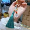 Colgante de Ágata con Borla de Vaina de Loto para Qipao y Accesorios