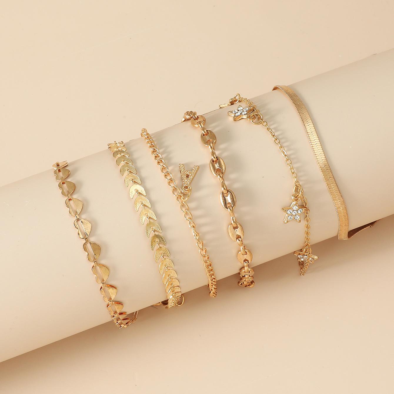 

Retro Multilayer Geometric Bracelet Set with Cold Style Metal Heart, Star, and Letter Charms