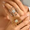 Chic Stainless Steel Hollow Flower Ring with Faux Pearl - Elegant Women's Floral Jewelry