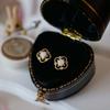 Hot sale Korean version of small fresh four-leaf clover white opal hollow flower stud earrings women's earrings retro ear jewelry