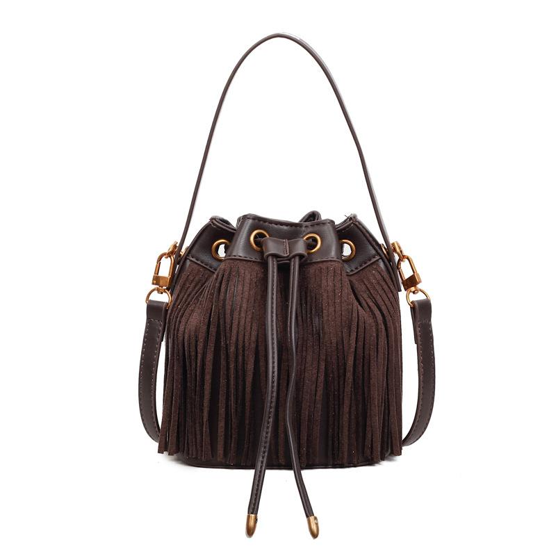 

Ethnic style simple retro fringed handbag women s niche trend casual versatile commuter shoulder messenger bag темно-коричневого