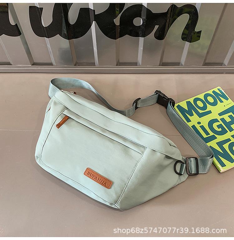 

Simple niche crossbody bag couple sports large-capacity chest bag 2025 new fashion casual Japanese shoulder bag синій