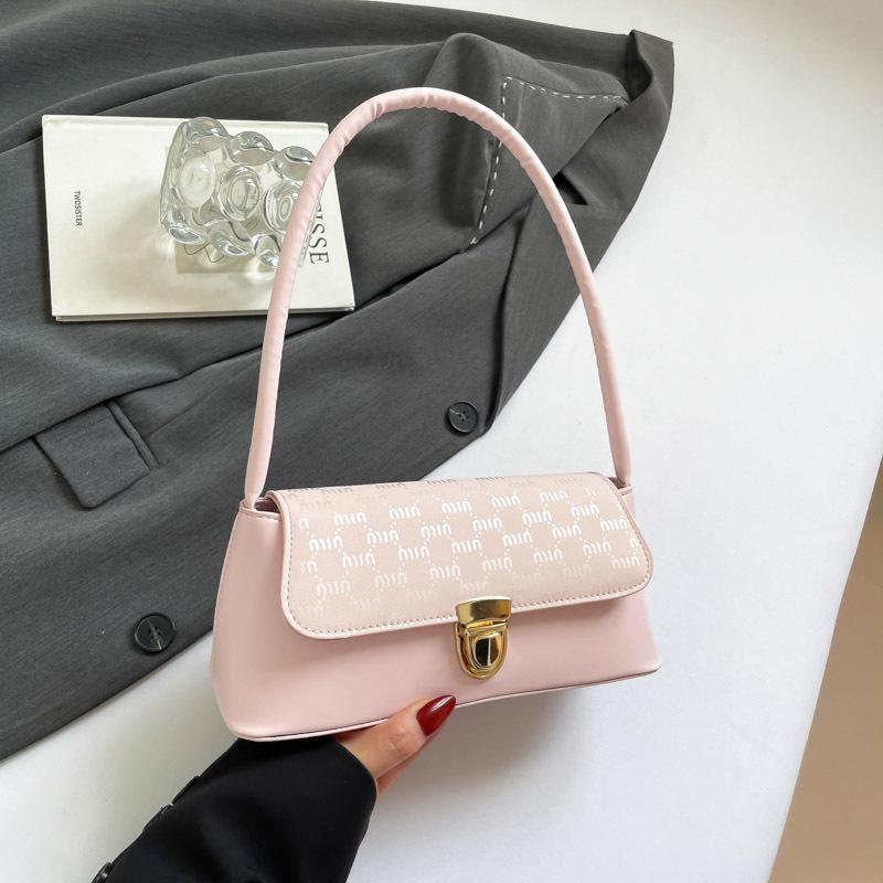 

2025 summer new Korean version personalized handbag Korean simple texture underarm bag is a fashionable and beautiful shoulder bag рожевий