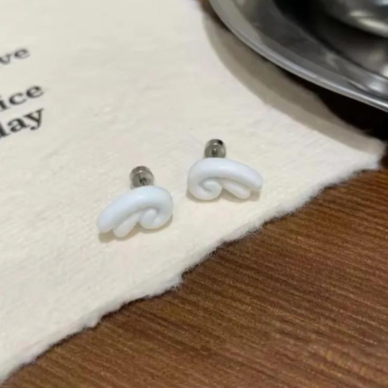 

Love Cross Tongue Nails Ear Nails Titanium Alloy External Thread Sweet Cool Spicy Girl Niche Ins Puncture Jewelry