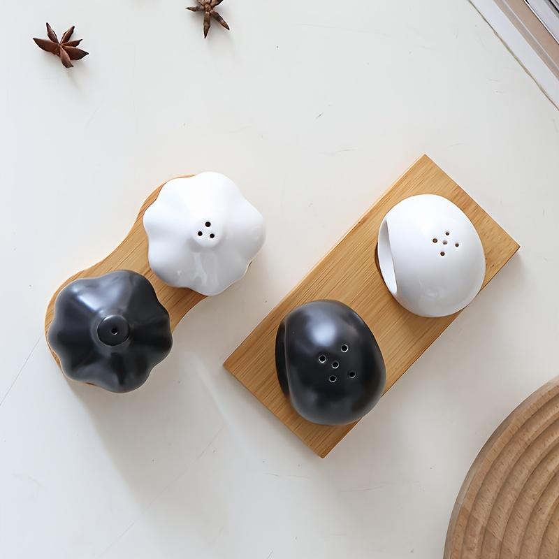1 Set of Stylish Ceramic Garlic Salt Pepper Shakers , Leakproof, Modern Kitchen Spice Containers with Elegant Black and White Design