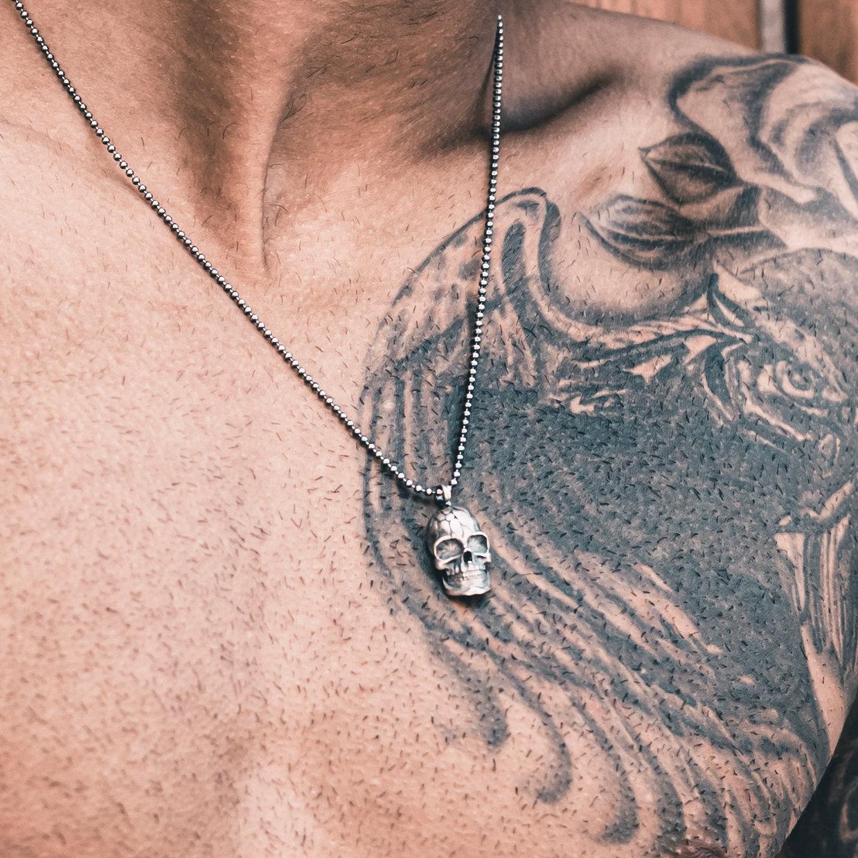 

Серебряное колье ручной работы с каменной головой 55cm серебряный