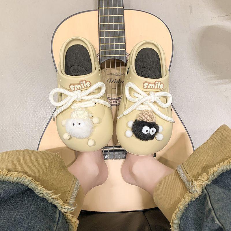 Comfortable and versatile casual seaside beach cool slippers 2025 summer fun cute plush black and white briquettes hole shoes