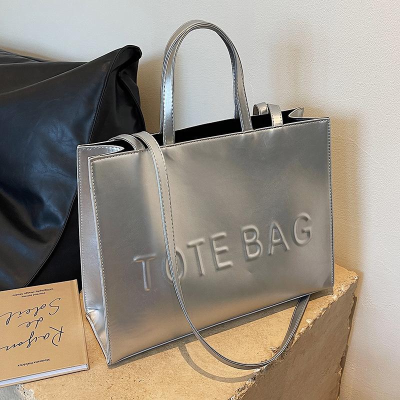 

Сумка большой вместимости женская новая простая и универсальная на плечо, сумка-мессенджер, текстурная, портативная, классная сумка-тоут No specification серебряный