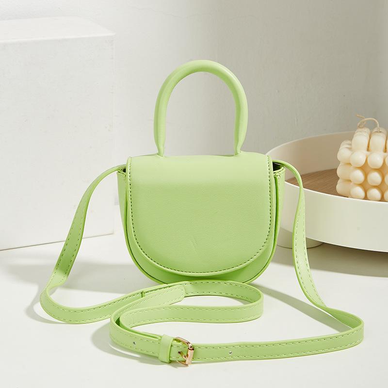 

Fresh and sweet handbag New women s bag Gentle solid color saddle bag Women s shoulder messenger bag