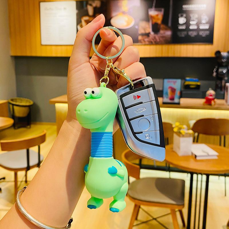 Adorable Cartoon Dinosaur Keychain Retractable Spring Pvc Toy For Kids And Couples