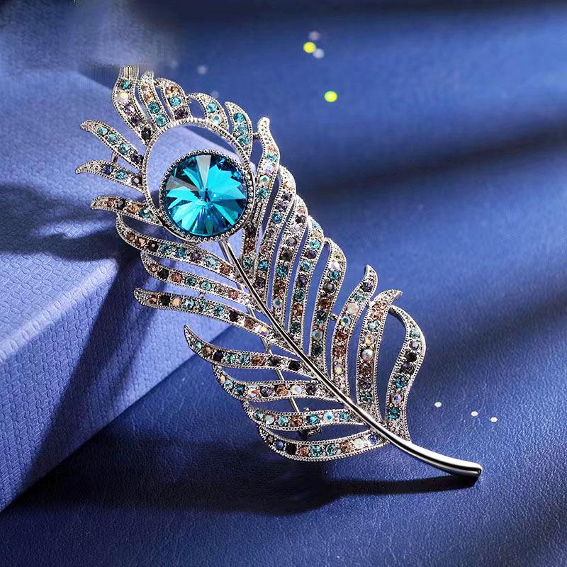 

Атмосферная брошь в виде пера, высококачественная женская роскошная темпераментная брошь из кристаллов, легкая роскошная брошь для костюма, аксессуары