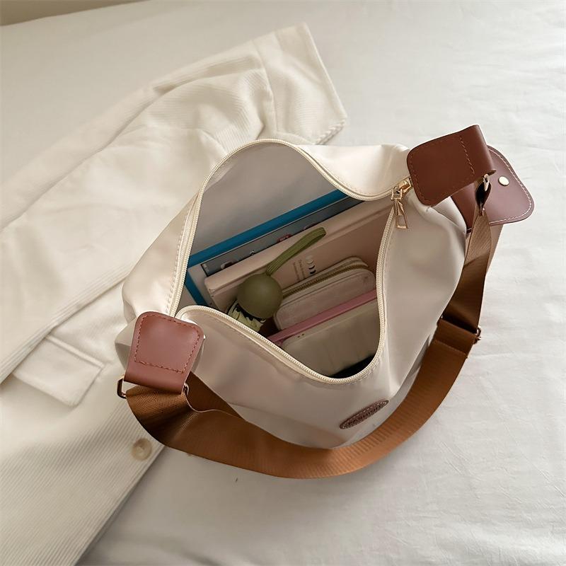 Nylon cloth bag women's large-capacity new versatile messenger bag cloth bag high-end commuter tote bag