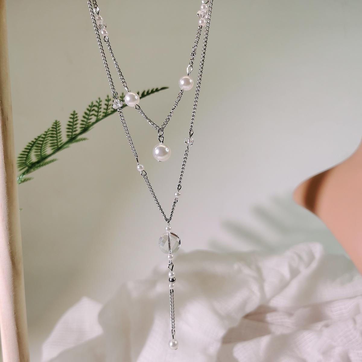 

Minimalist Y-Shaped Tassel Necklace: European & American Inspired Clavicle Chain for Women