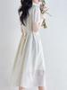 Elegant French-Style Summer Dress: Cinched Waist, Age-Defying Design