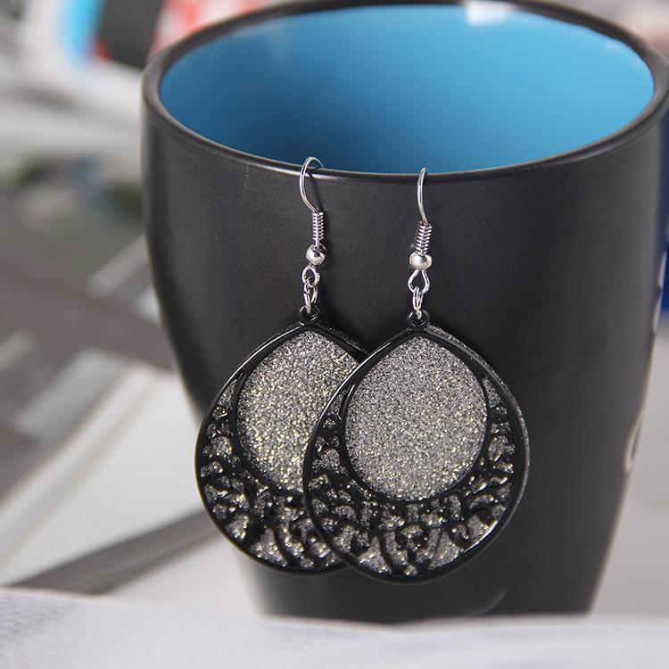 Frosted Geometric Leaf Tassel Earrings - Creative Hollow Round Design