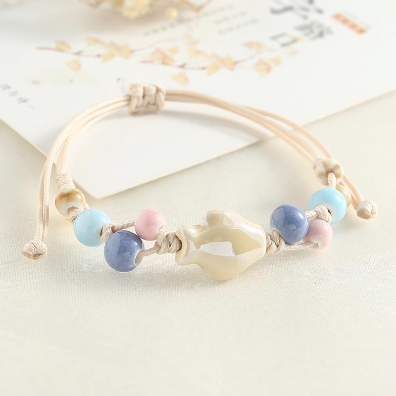 Jingdezhen Keramik Perlenarmband - Handgewebtes Porzellan mit Muschelakzenten