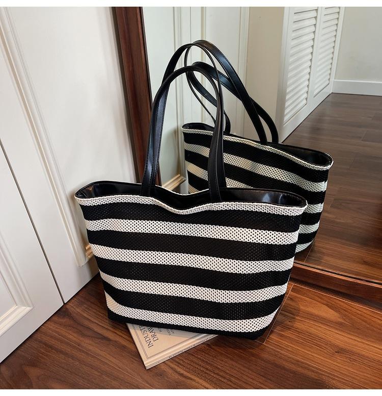 2025 Korean Version of Large-capacity Tote Bag Contrasting Color Striped Bucket Bag Summer New Hollow Lazy Wind Woven Bag