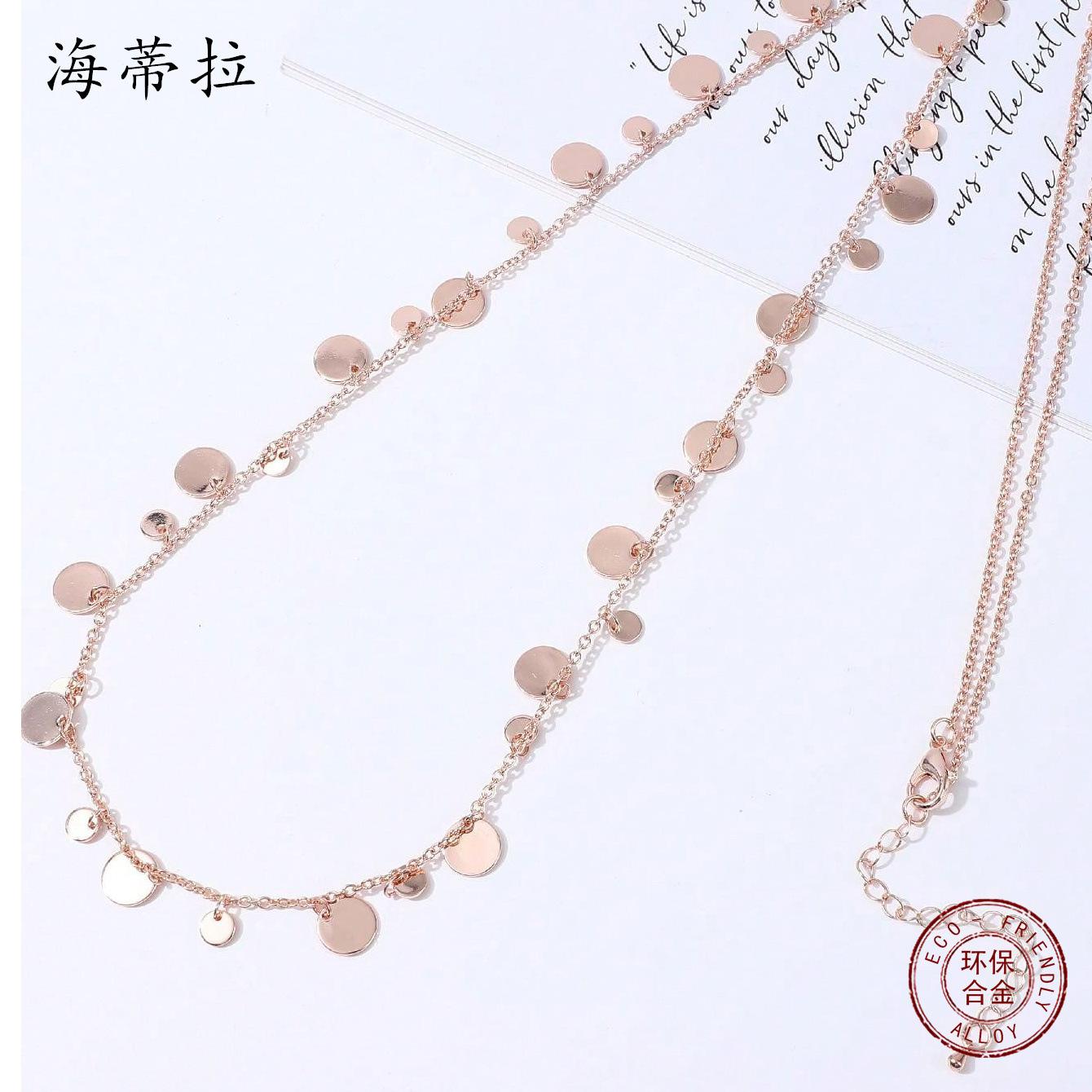 

New rose gold pendant, disc polka dot alloy necklace, temperament sweater chain.