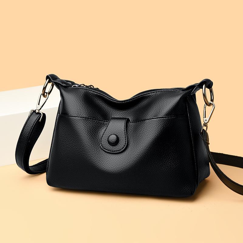 O geantă la modă și versatilă de mare capacitate, cu un singur umăr, din piele moale