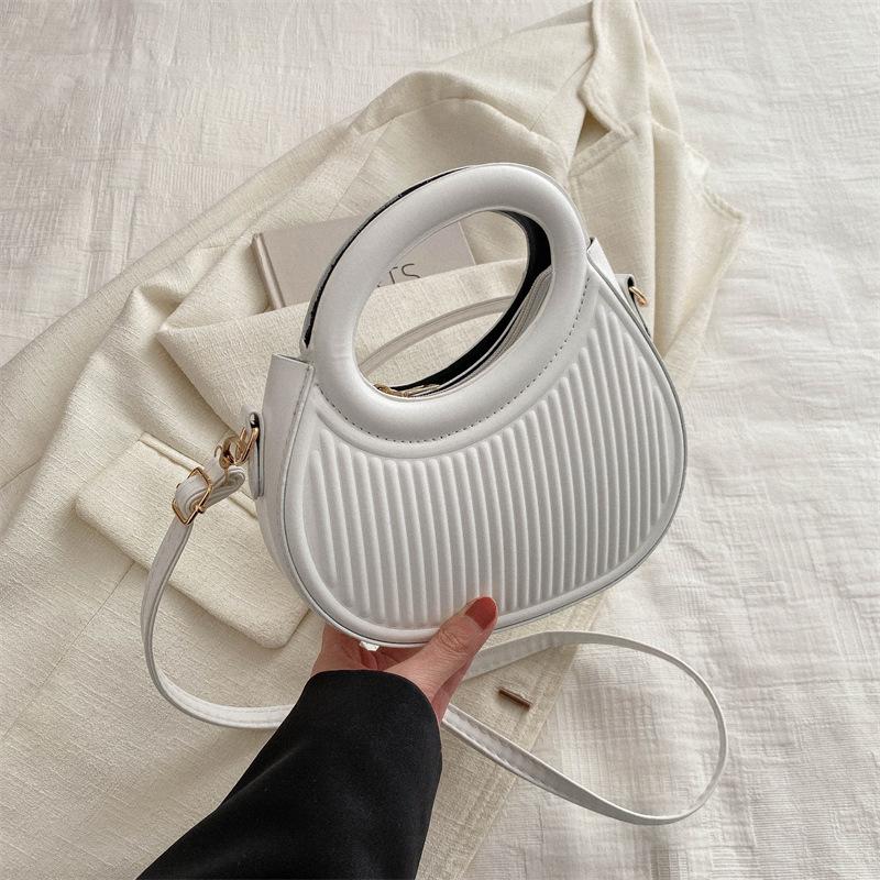 Solid color handbag women's 2025 early new fashion casual messenger bag portable small bag