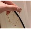 Elegant French Retro Heart Tassel Diamond Pendant Bracelet - High-End Fashion for Women.