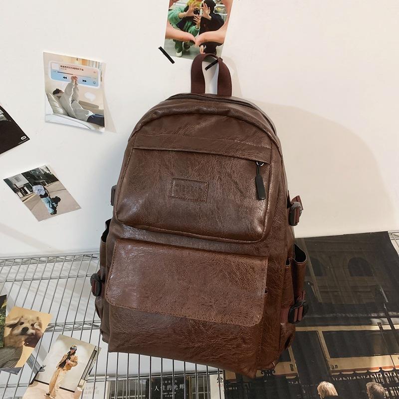 Korean version of PU men's backpack backpack travel bag student schoolbag computer men's bag tide