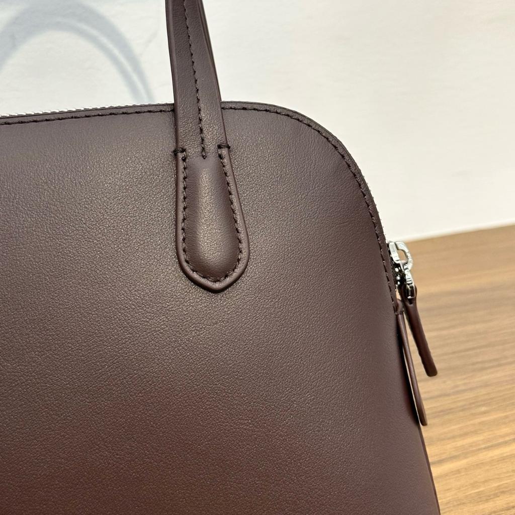 Niche first-layer cowhide minimalist 2026 new spring and summer shell bag single shoulder crossbody portable commuter bowling bag