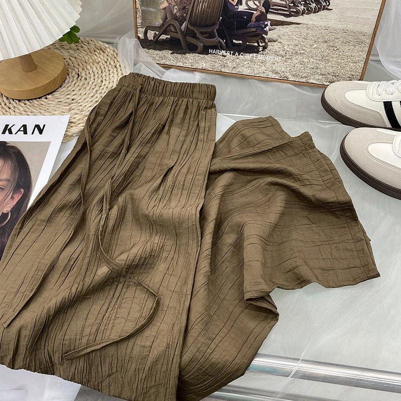 

Женские брюки с драпировкой и широкими штанинами на весну и лето. Тонкие свободные узкие прямые брюки в корейском стиле с завязками на резинке и высокой талией. Женские брюки Yamamoto. XXXL