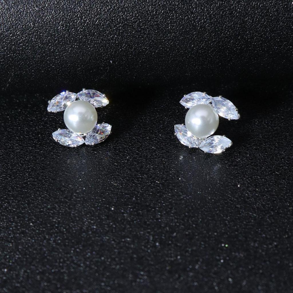 Luxuriöse Ohrstecker mit rosa Zirkon und Perle – Elegant und vielseitig für Frauen