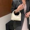 New Women's 2025 Niche Bag Solid Color Design High Sense Elegant Fresh Fashion Retro Versatile Handbag