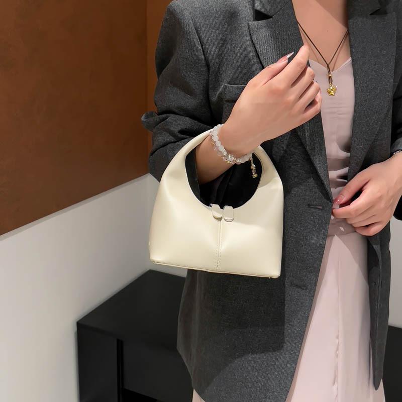 New Women's 2025 Niche Bag Solid Color Design High Sense Elegant Fresh Fashion Retro Versatile Handbag