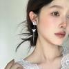 Light Luxury Flash Zirconium Butterfly Fringed Earrings, Fashion Temperament, Niche Earrings, High-end Mosquito Coil Disc Ear Clips, No Ear Piercings.