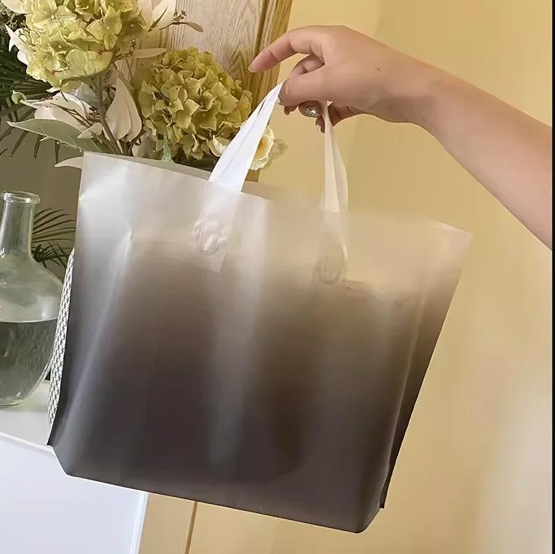 50pcs New models Handbag thick 0.14mm durable clothing cosmetic gift Shopping bags Resilient Powerful handheld Portable Packaging bag