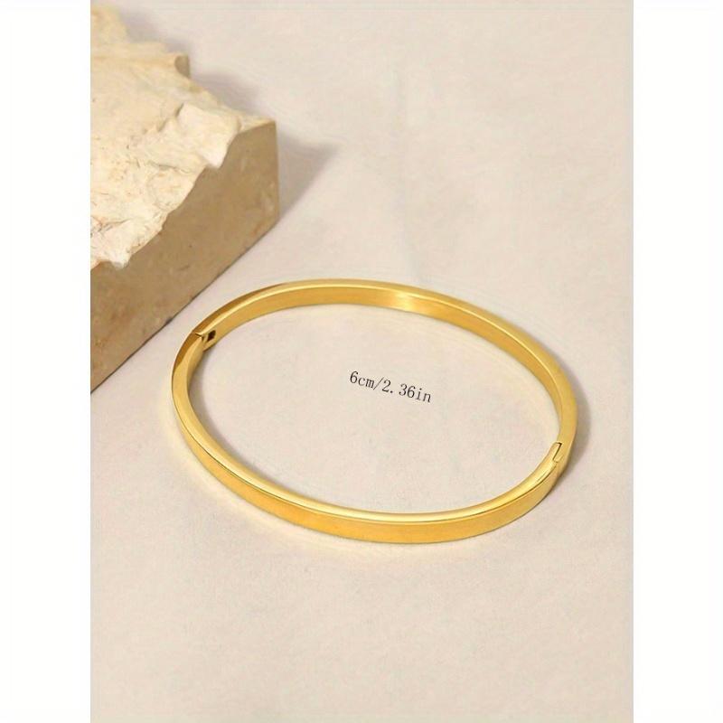

Парный титановый браслет-манжета с минималистичным дизайном и зеркальной полировкой one-size золотой