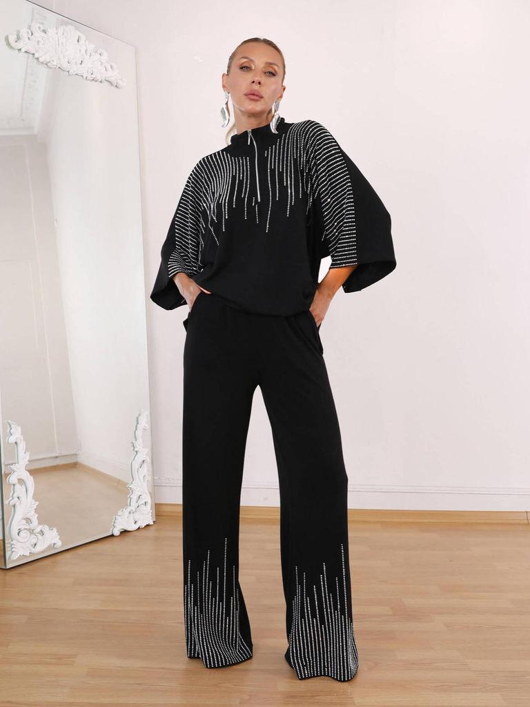 Podzimní dámská móda 2025: Šik dvoudílný set s ozdobným topem a kalhotami se širokými nohavicemi