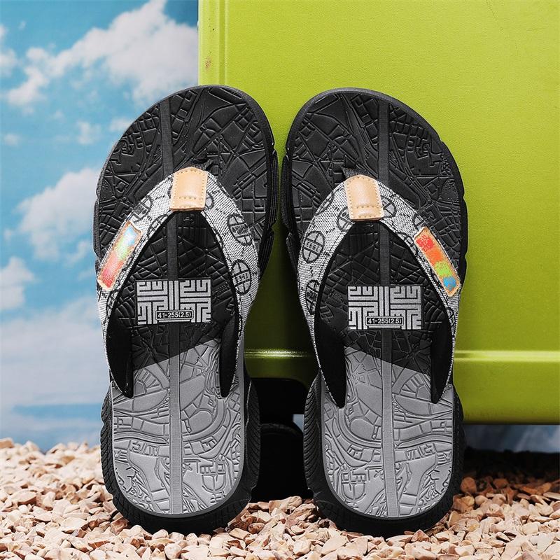 Fashion Men's colorful - pattern flip - flops. Upper with label, two - toned soles. Stylish, casual design. Comfortable & versatile.