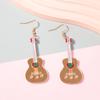 Unique acrylic mirror surface guitar ear hooks with a personalized, fashionable and creative design sense