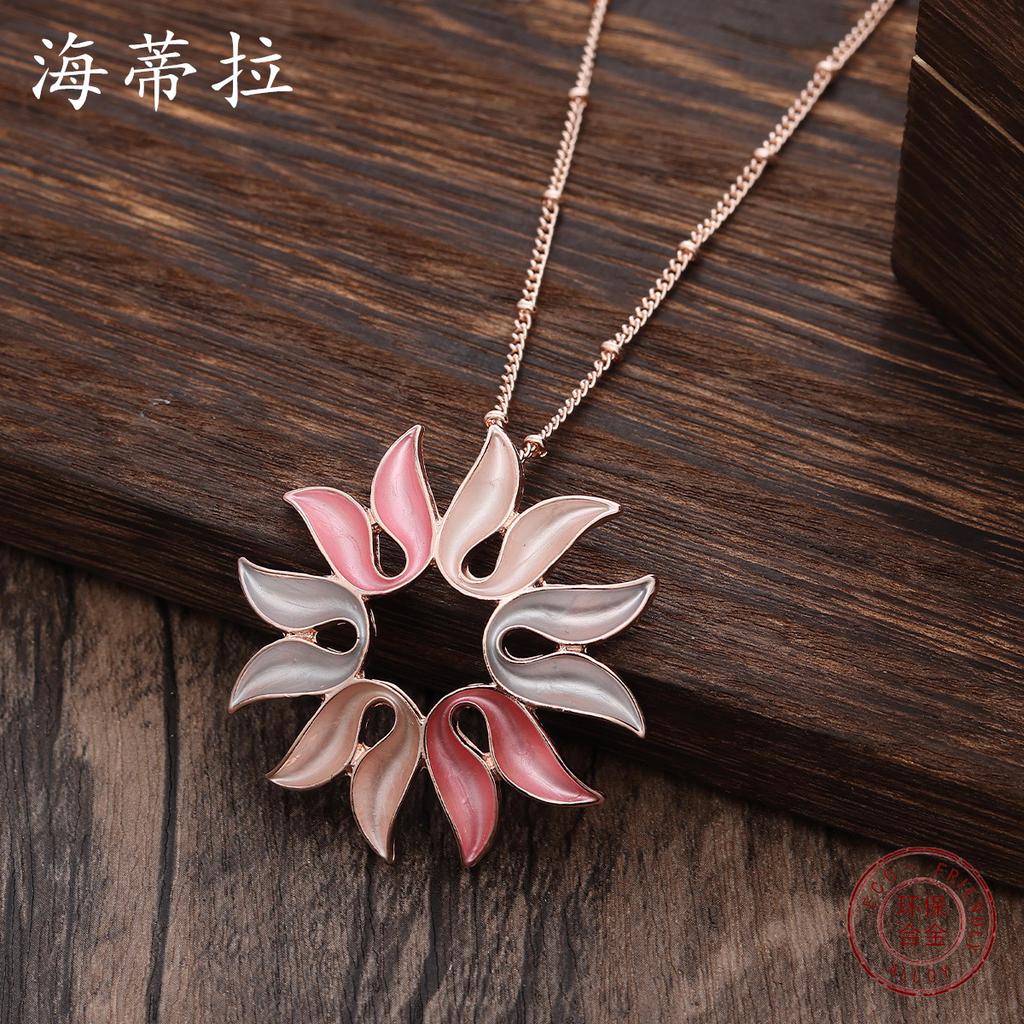 New color painting oil hollow sunflower pendant, women's personality versatile geometric flower necklace