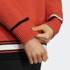 adidas Originálny pletený vianočný sveter s výstrihom do V a vyšívaným logom pre ženy, oranžový HS9520